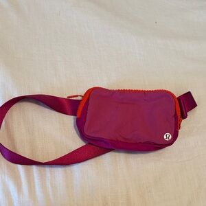Lululemon hot pink and Orange Belt Bag from lululemon